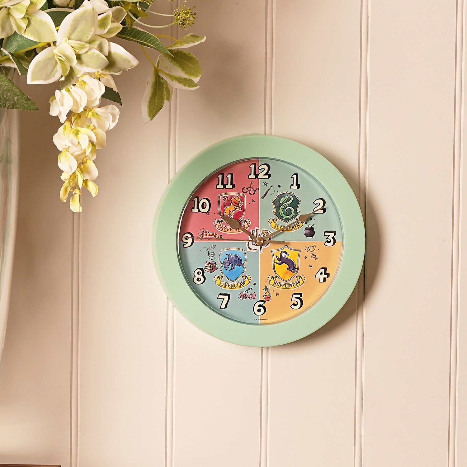 Horloge murale phosphorescente Harry Potter des 4 Maisons